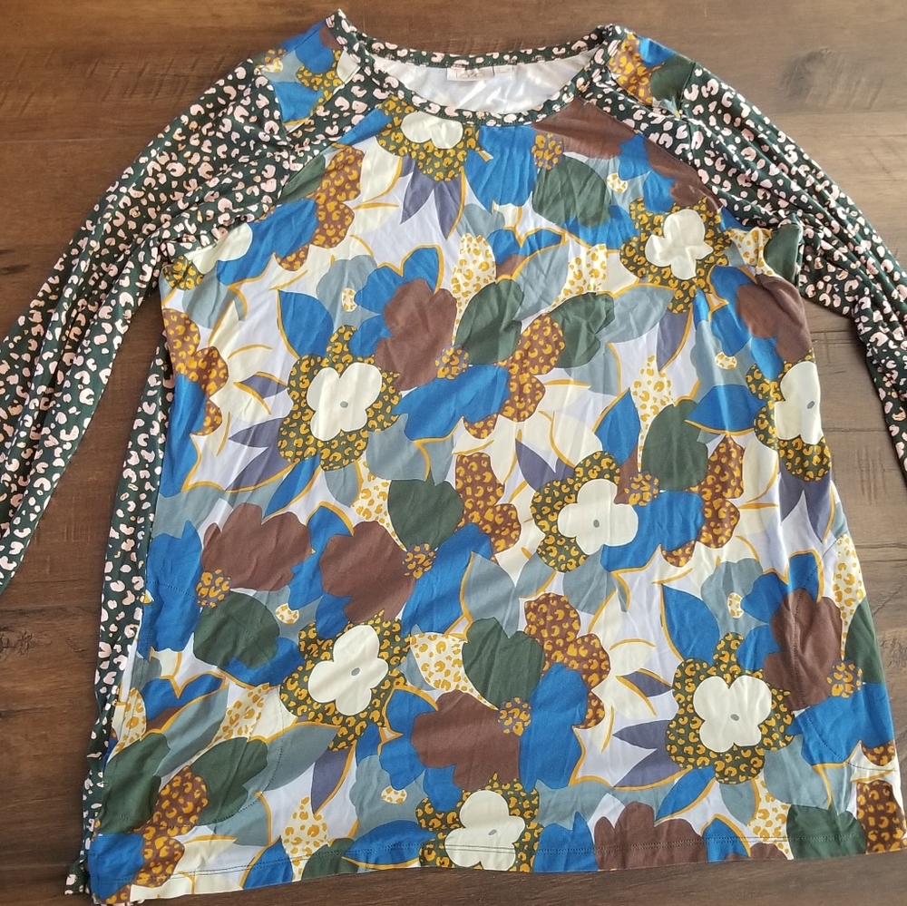 qvc logo Lori Goldstein tunic top with side pockets